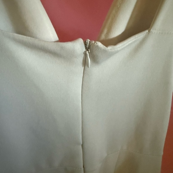 White Sleeveless Plunge Neckline Jumpsuit - Picture 2 of 5